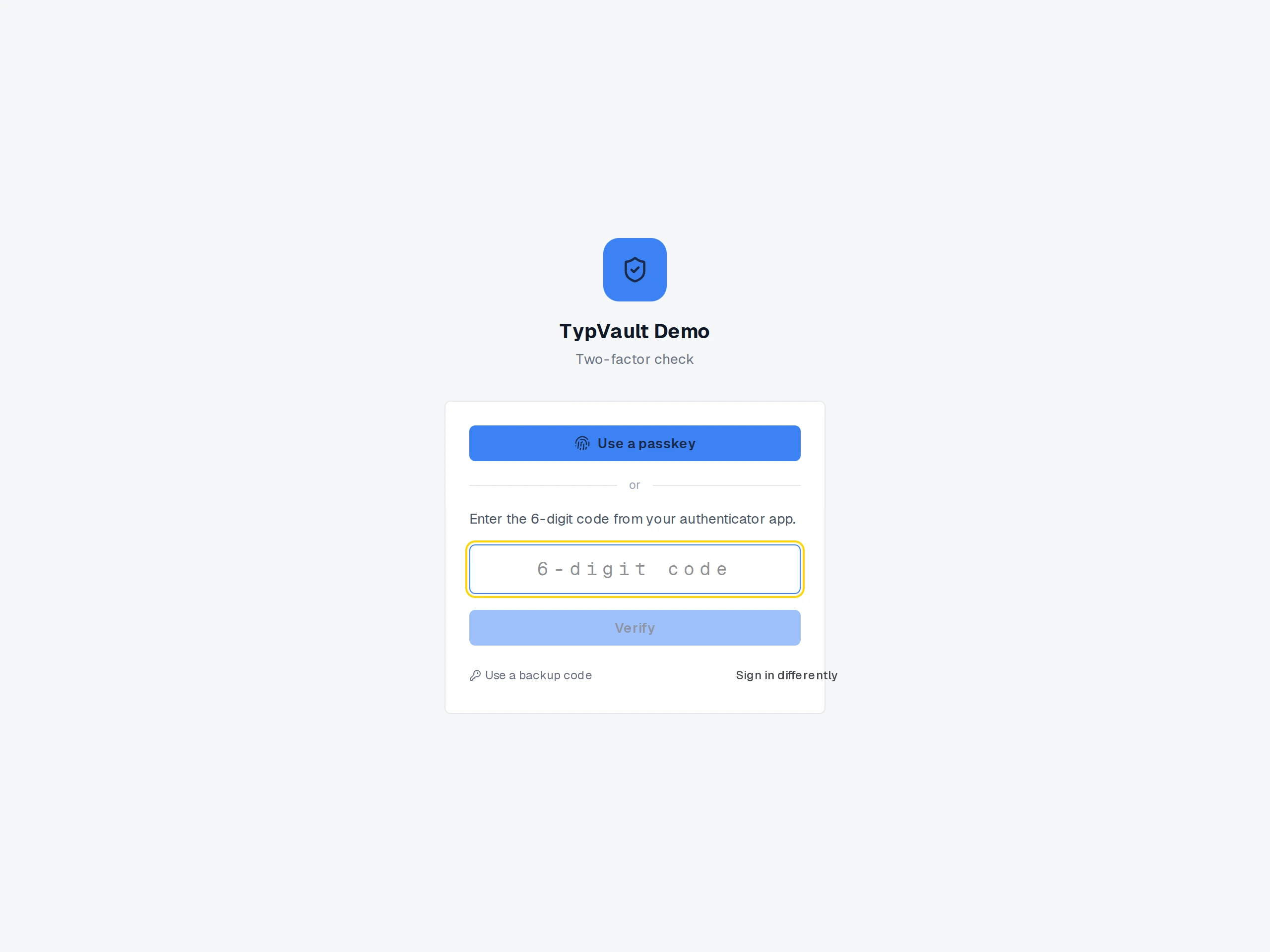 The two-factor check: a passkey button, or a field for the 6-digit code from an authenticator app.